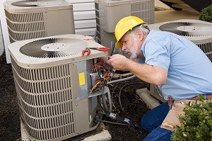 contractor performing hvac maintenance