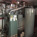 old oil boiler heating unit in blooming grove