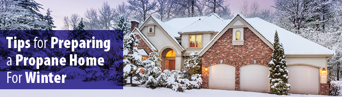 Large home in snowy yard with text "Tips for preparing a propane home for winter" on left-hand side. 